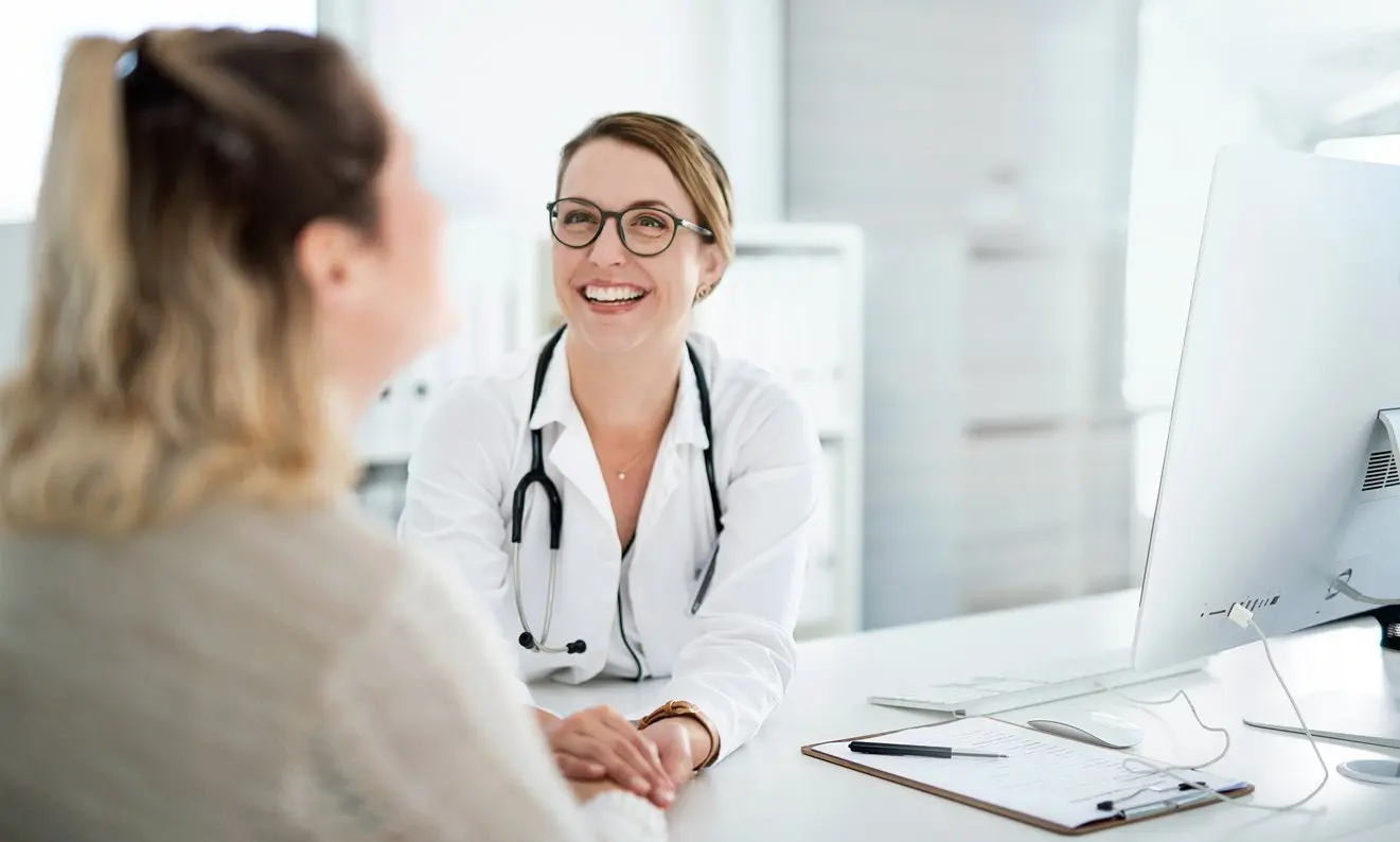 Healthcare provider consulting with a patient